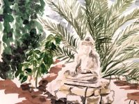 Meditierende Buddhastatue im Garten